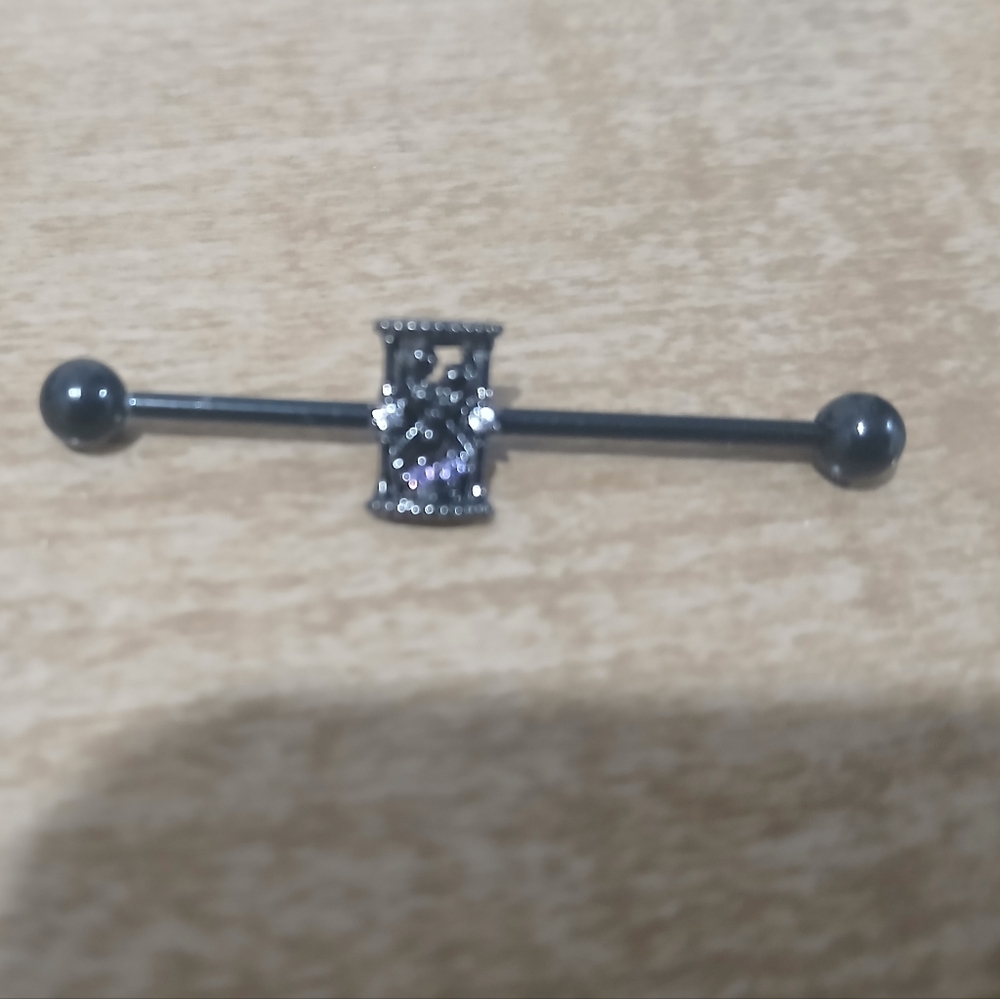 Elegant Black Barbell Piercing with Silver Detail